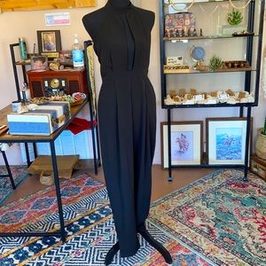 LOWCUT CLASSY BLACK ROMPER WITH OPEN BACK